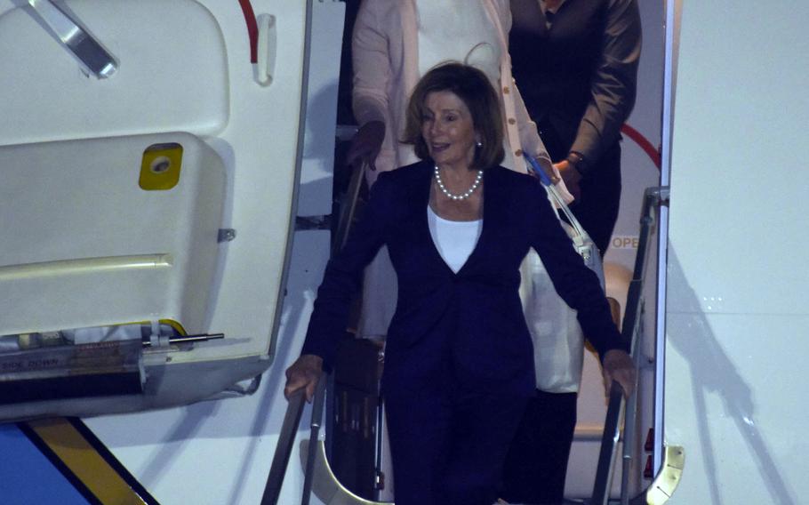 U.S. House Speaker Nancy Pelosi arrives with a congressional delegation at Yokota Air Base, Japan, Thursday, Aug. 4, 2022. 