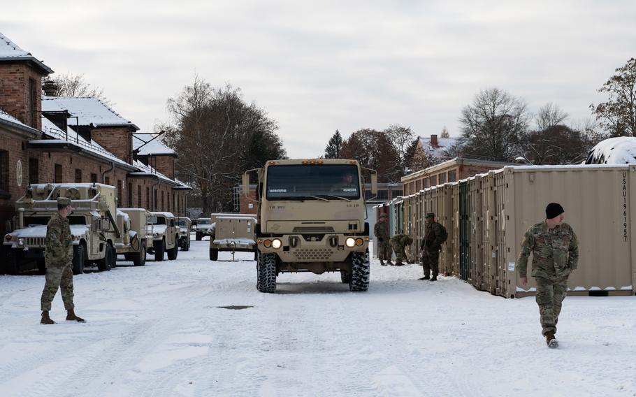 American soldiers from the Army’s 1st Infantry Division work at Camp Boles in Boleslawiec, Poland, on Dec. 13, 2022. 