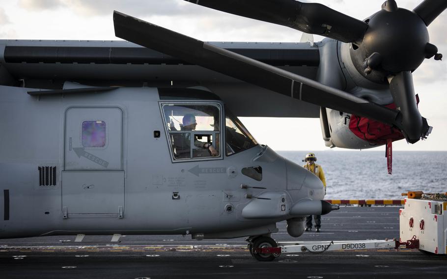 Sailors aboard the Wasp-class amphibious assault ship USS Kearsarge (LHD 3) tow a MV-22 Osprey, attached to Marine Medium Tiltrotor Squadron (VMM) 263, Jan. 31, 2022. The USS Kearsarge Amphibious Ready Group deployed Wednesday from Norfolk, headed south to pick up Marines from the 22 Marine Expeditionary Unit before heading across the Atlantic.