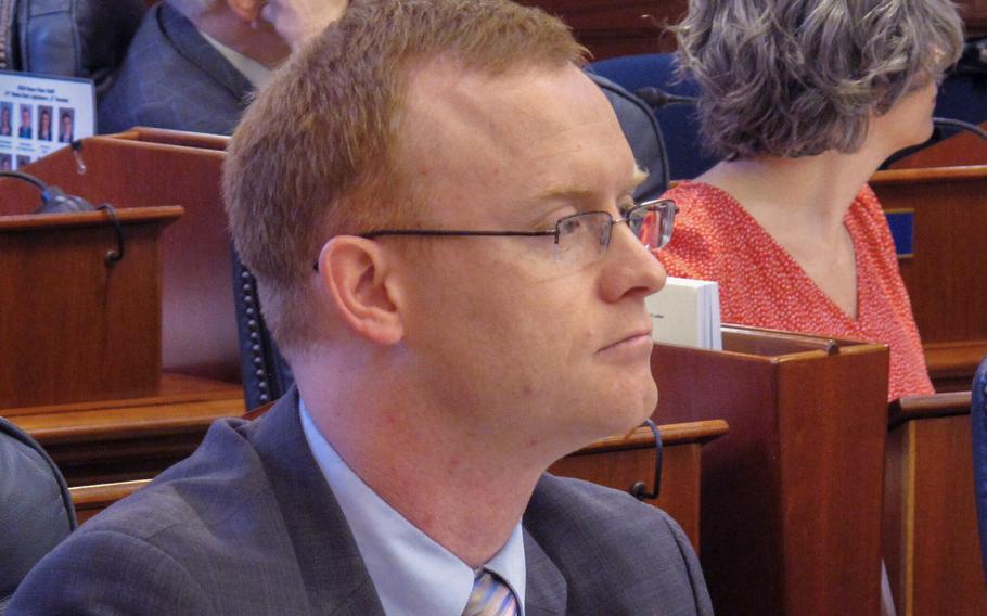 Alaska Rep. David Eastman sits at his desk on the Alaska House floor in Juneau, Alaska, on March 5, 2020.