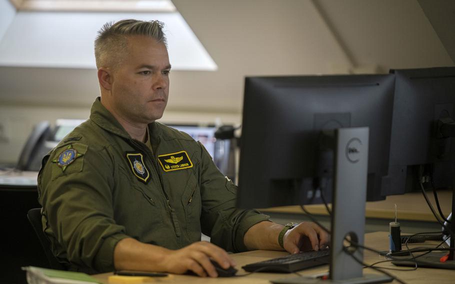 U.S. Air Force Col. Steven Lawhun, deputy chief of the EUCOM Control Center Ukraine, works at his station at Patch Barracks in Germany on June 3, 2022. The organization, hosted by U.S. European Command, facilitates deliveries of Western weaponry to Ukraine.