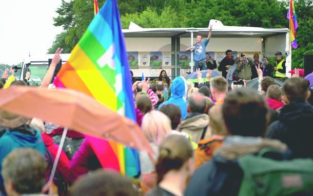 Hed: Protest for peace, 2016

Ramstein Air Base, Germany, June 11, 2016: Draped in rainbow peace flags and huddling under umbrellas, thousands of protesters converged in the rain outside Ramstein Air Base to demand the facility end its alleged support of U.S. drone operations. The rally, organized by the Berlin-based non-governmental alliance “Stopp Ramstein – No Drone War,” drew Germans from communities hundreds of miles away and was backed by dozens of peace organizations from the United States and abroad.

Read more at: https://www.stripes.com/theaters/europe/no-drone-war-thousands-converge-in-protest-outside-ramstein-1.414238

META TAGS: protest; anti-war; anti-military; protest rally; 