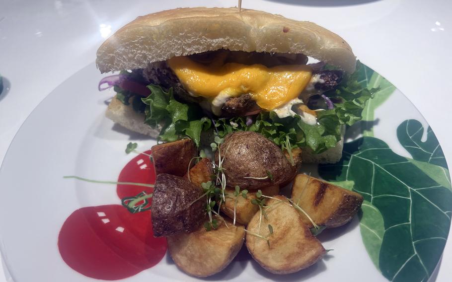 The plant-based Chicken Chunk burger with tandoori sauce and a side of fries from the Vegetarian Butcher in Nishi-Ikebukuro, Tokyo.