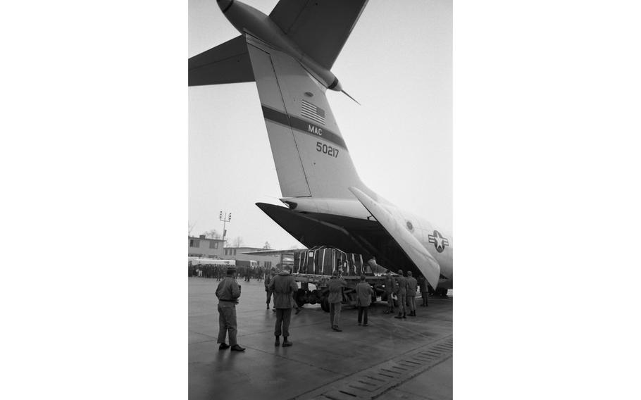 Cargo is offloaded off of the C141 StarLifter of the Military Airlift Command as part of the Reforger I/Carbide Ice exercise.