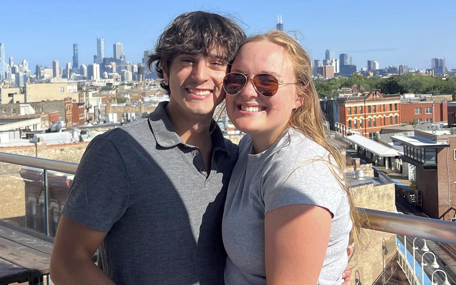 Miguel Corzo, 25, and Katie Richards, 25, shown last fall in Chicago, got engaged during the April 8 eclipse after participating in the Marriage Pact at Boston College in early 2021. The pact is a popular staple on nearly 90 campuses around the U.S. 