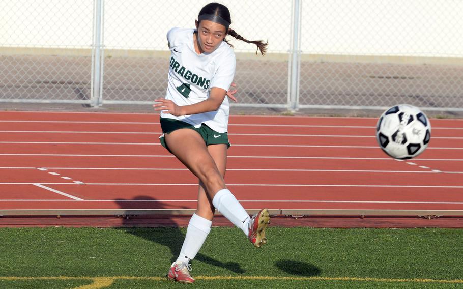 Sakura Lopez boots the ball.