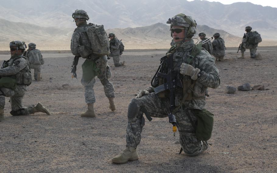 U.S. Army Soldiers assigned to 4th Battalion, 23rd Infantry Regiment, 2nd Stryker Brigade Combat Team, 2nd Infantry Division pull security outside of the city of Ujen during a Non-combatant Personnel Evacuation Operation (NEO), during Decisive Action Rotation 16-03, at the National Training Center, Fort Irwin, Calif., Jan. 18, 2016. The Pentagon will send Fort Riley’s 2nd Armored Brigade Combat Team, 1st Infantry Division to Europe and Joint Base Lewis-McChord’s 2nd Stryker Brigade Combat Team, 2nd Infantry Division to South Korea in the coming months, the Army announced Friday, Sept. 2, 2022.