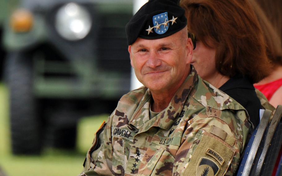 U.S. Army Europe and Africa commander Gen. Christopher Cavoli listens to speeches at the 21st Theater Sustainment Command change of command ceremony in Kaiserslautern, Germany in June 2021. Cavoli, who has led USAREUR for the past four years, has been tapped to serve as the next head of U.S. European Command, the Wall Street Journal reported April 11, 2022. 