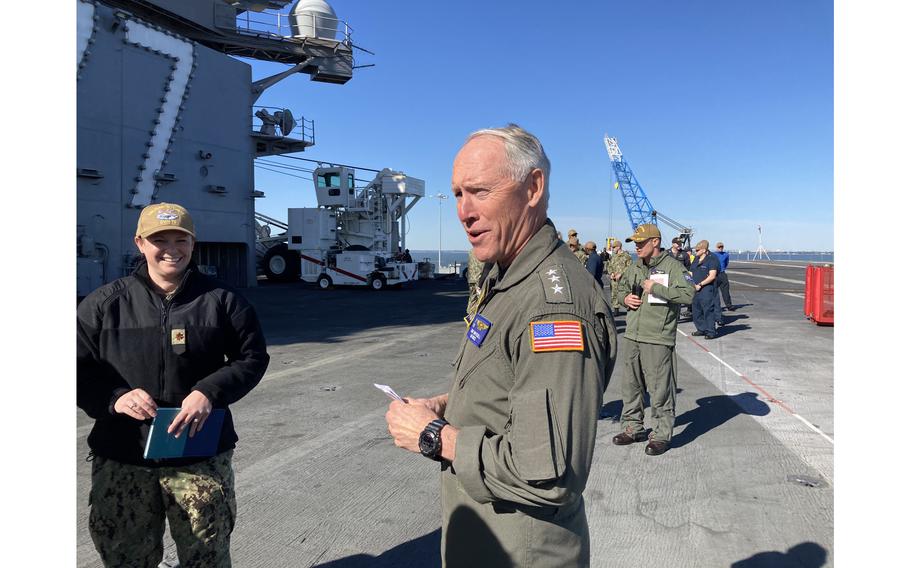 Vice Adm. Kenneth Whitesell, commander of Naval Air Forces, speaks about the future of naval aviation on the flight deck of USS George H.W. Bush on Monday, March 21, 2022.