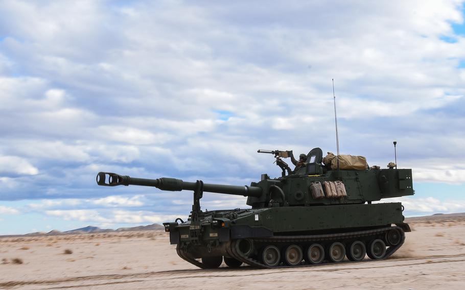 An M109A7 Paladin howitzer with the Army’s 1st Battalion, 9th Field Artillery Regiment of the 3rd Infantry Division’s 2nd Armored Brigade Combat Team drives across desert terrain at the National Training Center at Fort Irwin, Calif., during a training exercise Feb. 27, 2023.