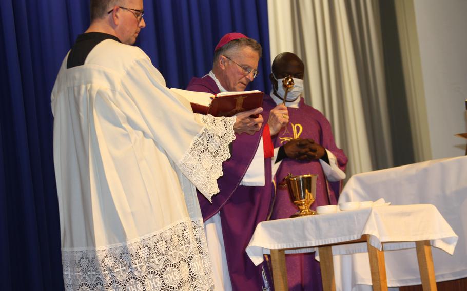 Archbishop Timothy Broglio, Archdiocese for the Military Services, blesses the ashes during the Ash Wednesday Mass at Walter Reed National Military Medical Center on Feb. 22, 2023, in Memorial Auditorium. Republican lawmakers are demanding answers from the Defense Department over the recent ousting of a longtime Roman Catholic religious services provider at Walter Reed National Military Medical Center that they argue has left patients with insufficient pastoral care. 