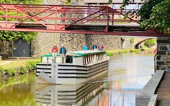 The canal boat Georgetown Heritage cruises down the C&O Canal. The custom-built tour boat returned to the canal in 2022 and began its second season of operation in May 2023. 