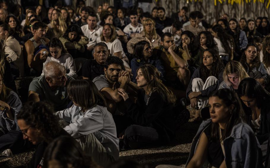 On the eve of Holocaust Remembrance Day, Israelis attend an event Sunday, May 5, 2024, in Tel Aviv with family members of hostages being held in Gaza.