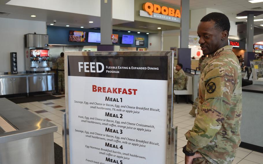 A soldier reads a display.