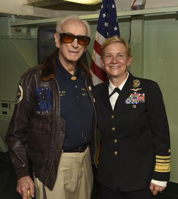 Vice Adm. Nora W. Tyson, then commander of U.S. 3rd Fleet, takes a photo with Dean “Diz” Laird while touring the USS Hornet Museum during San Francisco Fleet Week, Oct. 5, 2016, in Alameda, Calif.