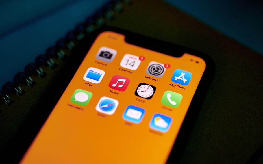 The Apple App Store app on a smartphone arranged in New York, U.S., on Monday, Aug. 14, 2023. The U.S. Supreme Court let Apple Inc. keep its App Store payment rules in place for the time being, rejecting an Epic Games Inc. request that would have let developers start directing iPhone users to other purchasing options. 
