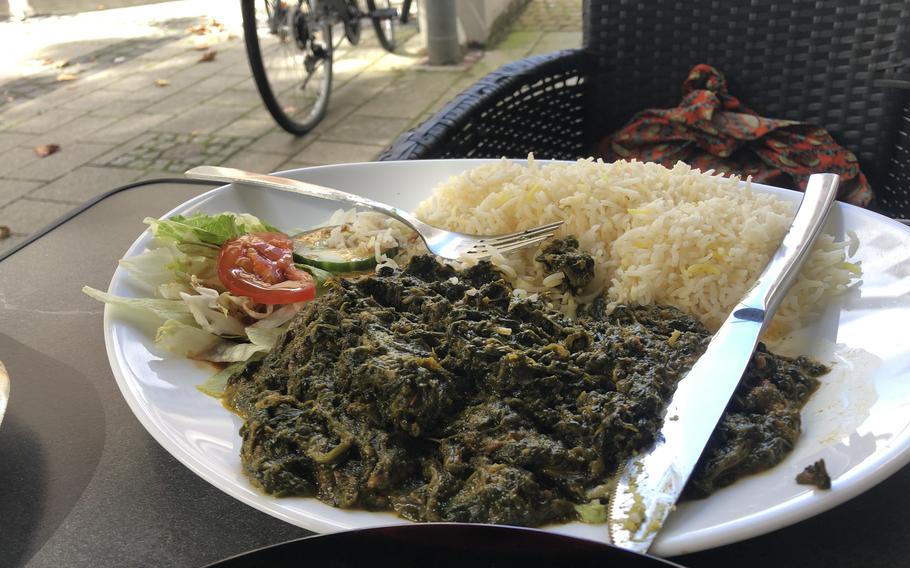 The palak paneer at Raj Mahal in Kaiserslautern, Germany, could use more cheese. It is served with rice for 10.50 euros.