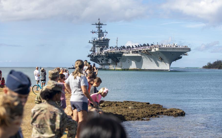 Aircraft carrier USS Abraham Lincoln arrives at Joint Base Pearl Harbor-Hickam, Hawaii, June 28, 2022, to participate in the Rim of the Pacific exercise. 