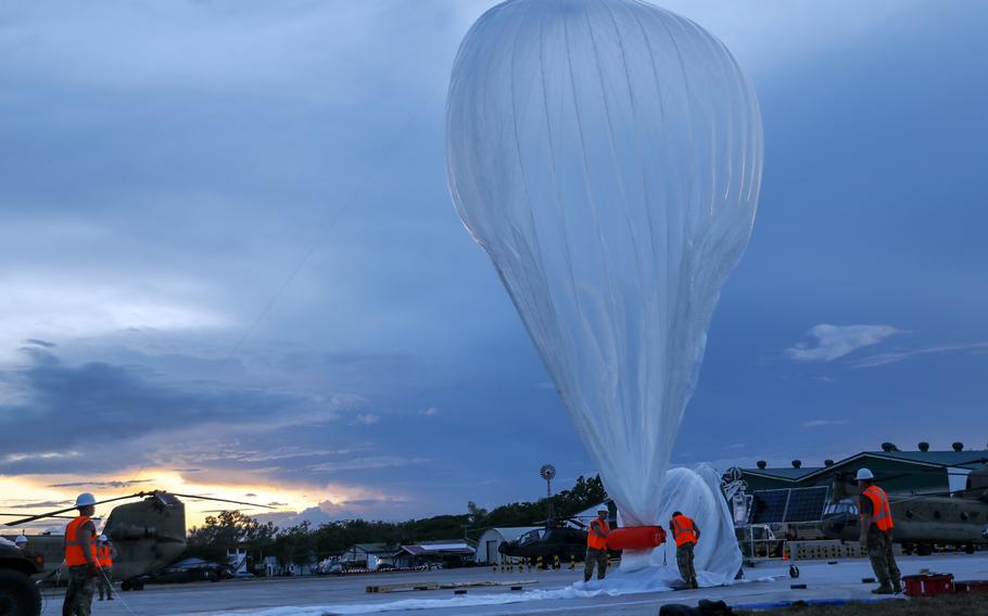 U.S. soldiers launch a Thunderhead High-Altitude Balloon System during the annual Balikatan drills at Fort Magsaysay in Nueva Ecija, Philippines, April 1, 2022.
