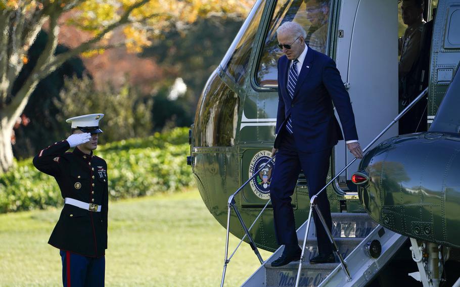 President Joe Biden walks off of Marine One on the South Lawn of the White House in Washington, Friday, Nov. 19, 2021, as he returns from Walter Reed National Military Medical Center.