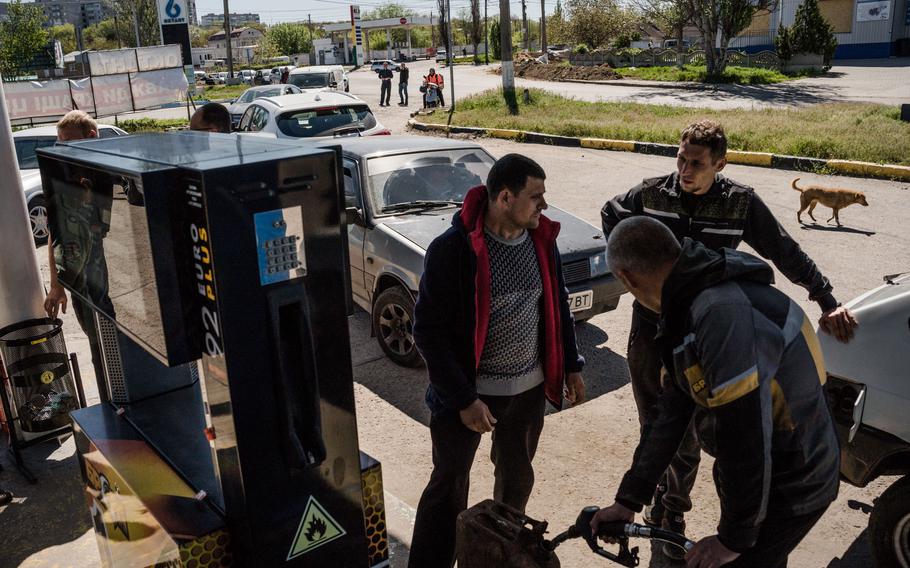 Motorists wait in line for gas at a service station in Mykolaiv, Ukraine.