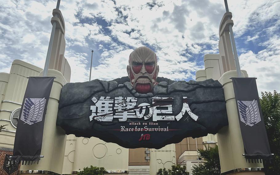 A giant Titan greets visitors to the "Attack on Titan" section at Universal Studios Japan in Osaka.