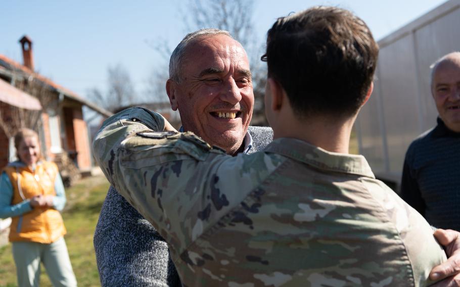 Novica Jovanovic welcomes U.S. soldiers in Babush, an ethnic Serbian enclave in Ferizaj, Kosovo, Feb. 22, 2024.