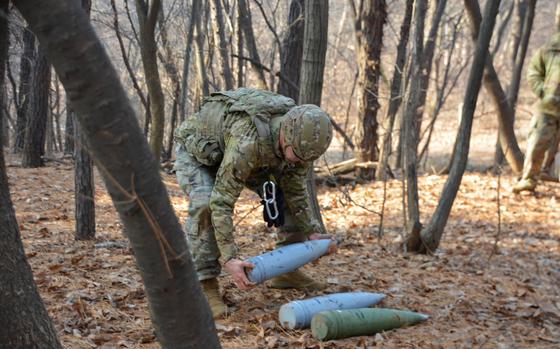 Army Staff Sgt. Mark Gersper removes simulated unexploded ordnance during the Korea EDO Team of the Year competition at Camp Humphreys, South Korea, Jan. 11, 2023. He serves as a team leader for 718th Ordnance Company (EOD), 23rd Chemical, Biological, Radiological and Nuclear Battalion.
