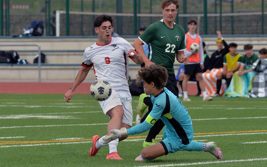 Naples keeper Joey Randazzo comes out to make a stop on American Overseas School of Rome’s Andrea Torelli in the Division II boys title game at the DODEA-Europe soccer championships in Ramstein, Germany, May 22, 2025. Naples won the all-Italy match 5-2.