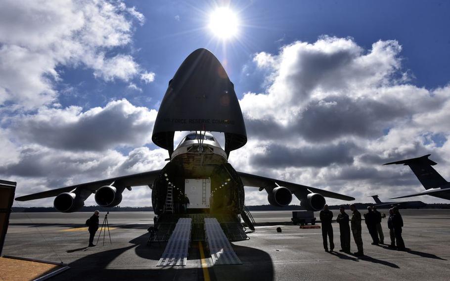 A giant C-5M Super Galaxy is ready to receive cargo as Westover Air Reserve Base in Chicopee, Mass.