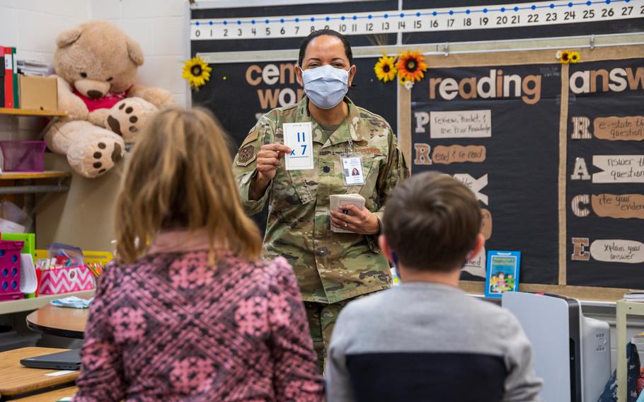 Lt. Col. Susana Corona plays a math game called Around the World with students at Estancia Elementary School Feb. 8, 2022. Corona volunteered to serve as a substitute teacher as part of Task Force Supporting Teachers and Families.