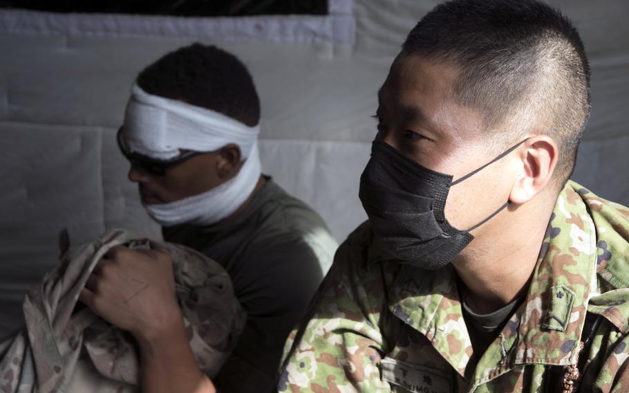 Japanese and American troops simulated injuries ranging from severe burns to broken bones during the annual Remote Island Disaster Exercise on Okinawa, Tuesday, Nov. 2, 2021.
