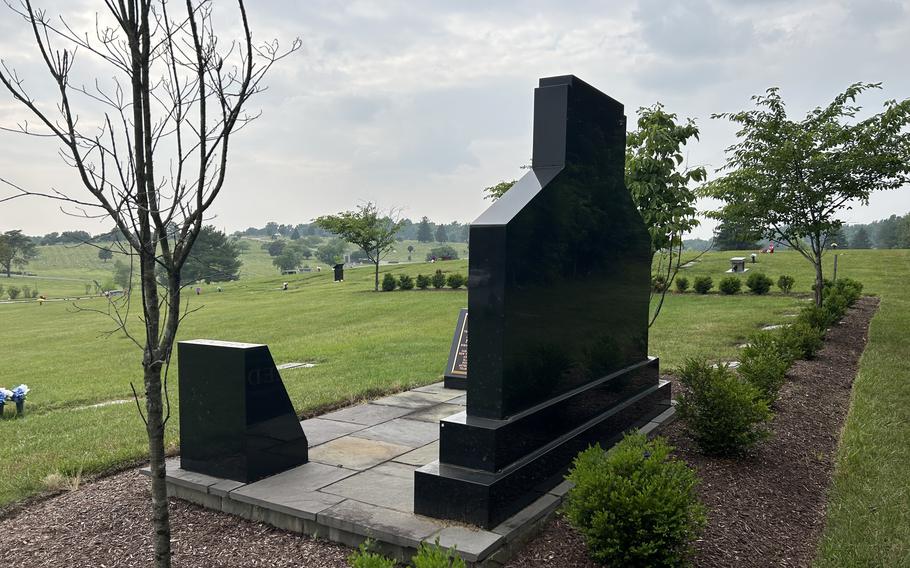 Seven miles southwest of the Northup-Reed monument in National Harmony Memorial Park in Landover, Md., the U.S. Capitol dome carries the Statue of Freedom, obscured here by clouds and smoke from wildfires in Canada.