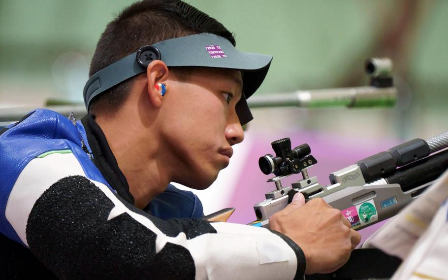 U.S. Army Staff Sgt. Kevin Nguyen prepares to fire during a Tokyo Paralympics shooting event at Camp Asaka, Japan, Wednesday, Sept. 1, 2021. 
