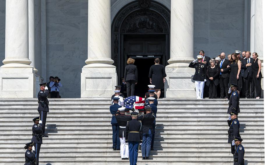 A U.S. military honor guard carries the casket of World War II veteran Hershel Woodrow “Woody” Williams up the steps of the U.S. Capitol, where he was to lie in honor for several hours on Thursday, July 14, 2022. Williams, who was the last living Medal of Honor recipient who fought in World War II, died on June 29. He was 98.
