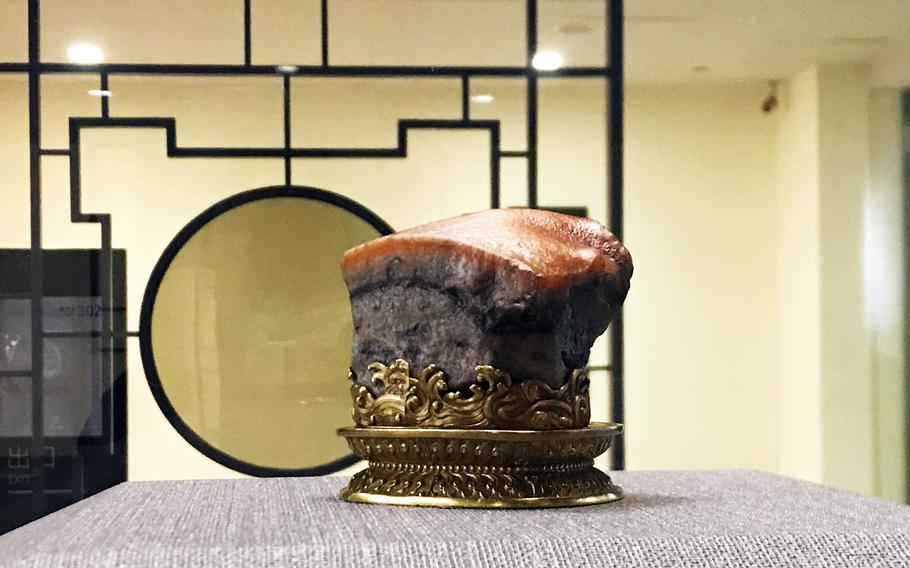 The Meat Shaped Stone at the National Palace Museum in Taiwan was carved from jasper and dyed to resemble a succulent piece of pork marinated in soy sauce.