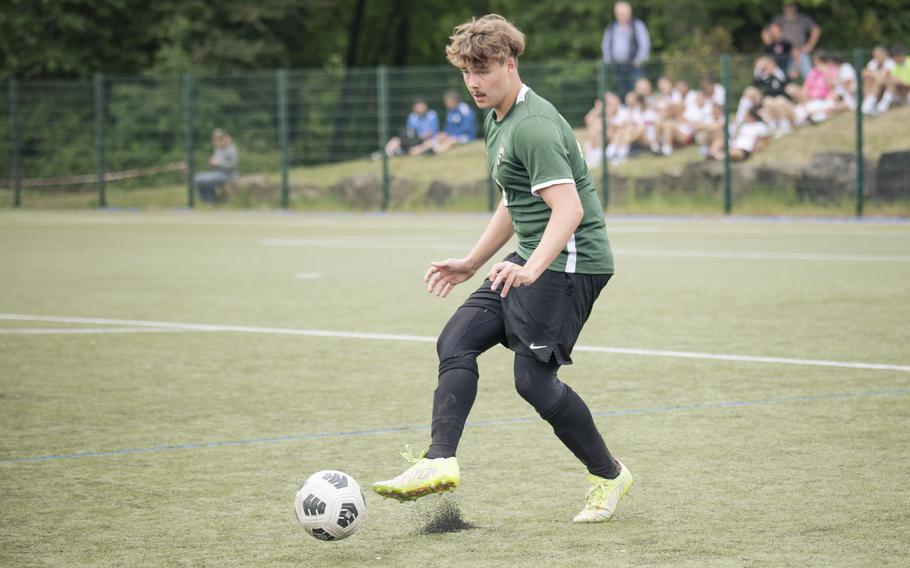 Naples Wildcats junior Landon Heavrin passes the ball in a match against the Vicenza Cougars during the semifinals of the 2025 Division II DODEA European championships at Reichenbach-Steegen, Germany on May 21, 2025.
