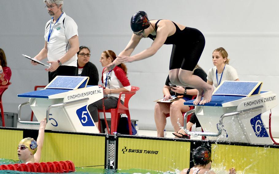 Victoria O'Hara of Stuttgart dives into the pool as the third leg of the 13-to-14-year-old 4x50-meter mixed relay at the 2023 European Forces Swim League Short Distance Championships on Saturday at the Pieter van den Hoogenband Zwemstadion at the Zwemcentrum de Tongelreep.