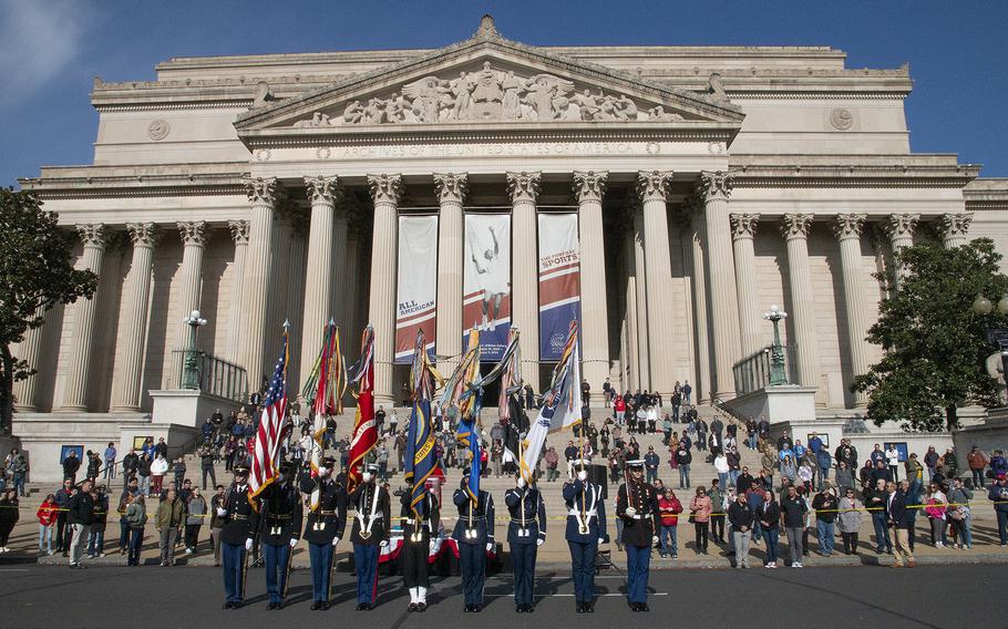 The Armed Forces Color Guard, in front of the National Archives before the National Veterans Day Parade on Sunday, Nov. 12, 2023, in Washington. 