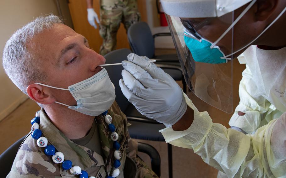 A soldier at Schofield Barracks, Hawaii, is tested for COVID-19 during in-processing for the 2021 U.S. Army Medical Command Best Leader Competition on July 24, 2021.