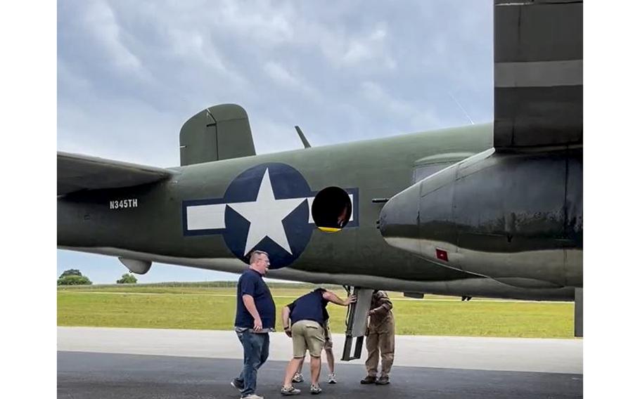 A video screen grab shows a WWII-era B-25 being prepared for an honor flight. Honor Flight Bluegrass/Facebook
