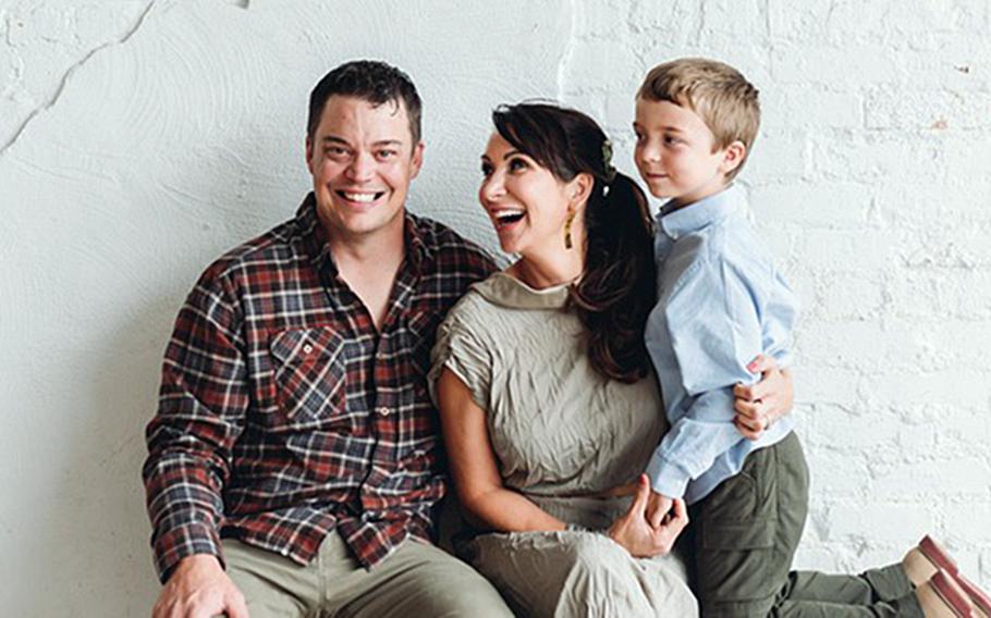 Chief Warrant Officer 4 Garrett Illerbrunn, seen here with his wife, Lorna, and son, Tucker, was critically wounded in a Christmas drone attack in Iraq and is now receiving treatment at Landstuhl Regional Medical Center, Germany, according to hospital officials.