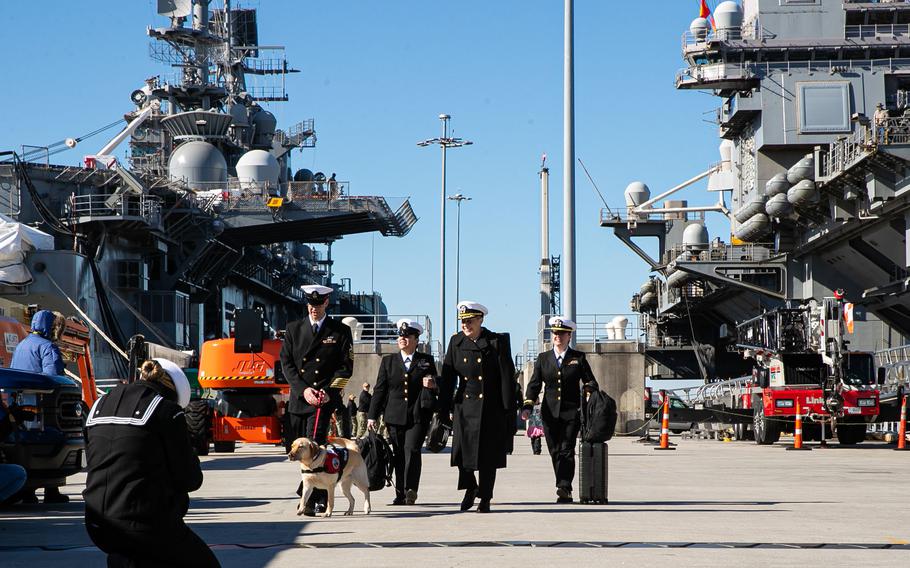 Sailors assigned to the USS Gerald R. Ford depart the ship upon returning from its eight-month maiden deployment, Jan. 17, 2024.