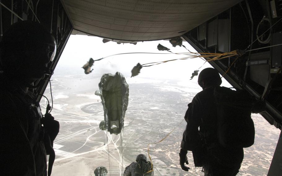 Members of the U.S. Army’s 10th Special Forces Group leap from a U.S. Air Force 352nd Special Operations Group C-130 Talon during a joint exercise between the American and Senegalese militaries. 