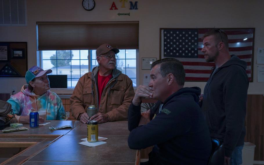 "We gotta get this law passed," Zeller told local VFW post manager Rosalyn Knutson, left, and post quartermaster Dale Foertsch, right, in Casper, Wyo., of the Afghan Adjustment Act. MUST CREDIT: Washington Post photo by Bonnie Jo Mount.