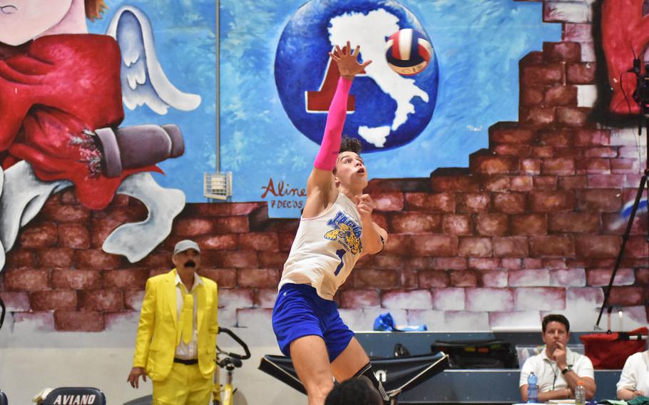 Sigonella's CJ Davis leaps before connecting with the ball in the Jaguars' semifinal loss to American Overseas School of Rome on Friday, Oct. 28, 2022.

Kent Harris/Stars and Stripes