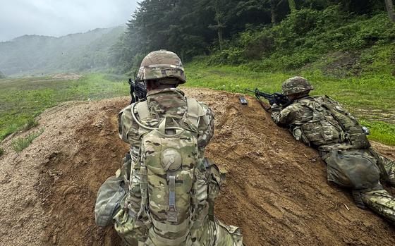 Soldiers with the Theater Air Naval Ground Operations, or TANGO, security force fire from cover at the Rodriguez Live Fire Complex in Pocheon, South Korea, June 25, 2025.
