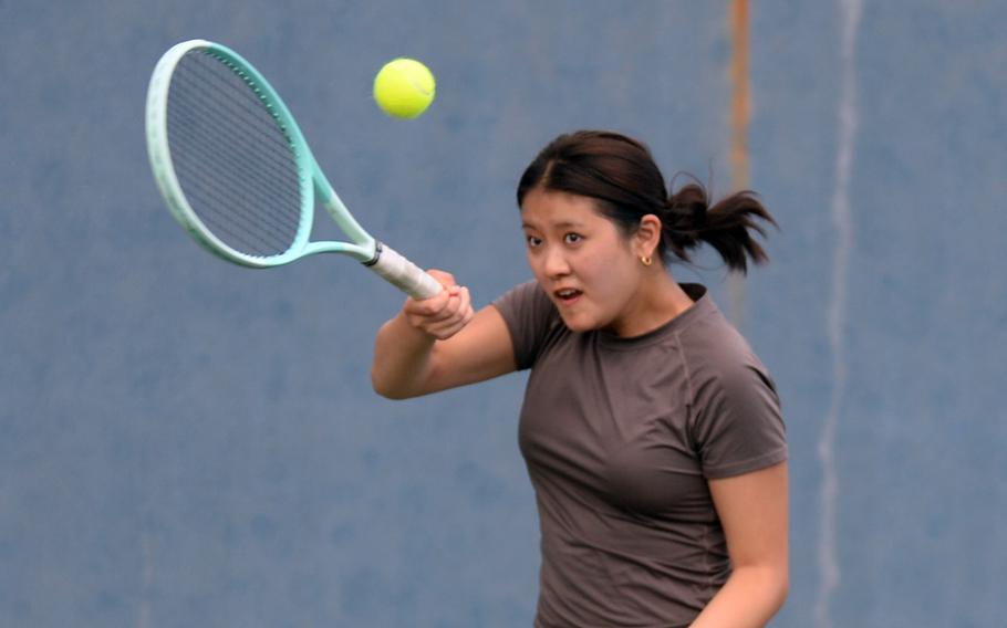 Irene Won hits the ball.