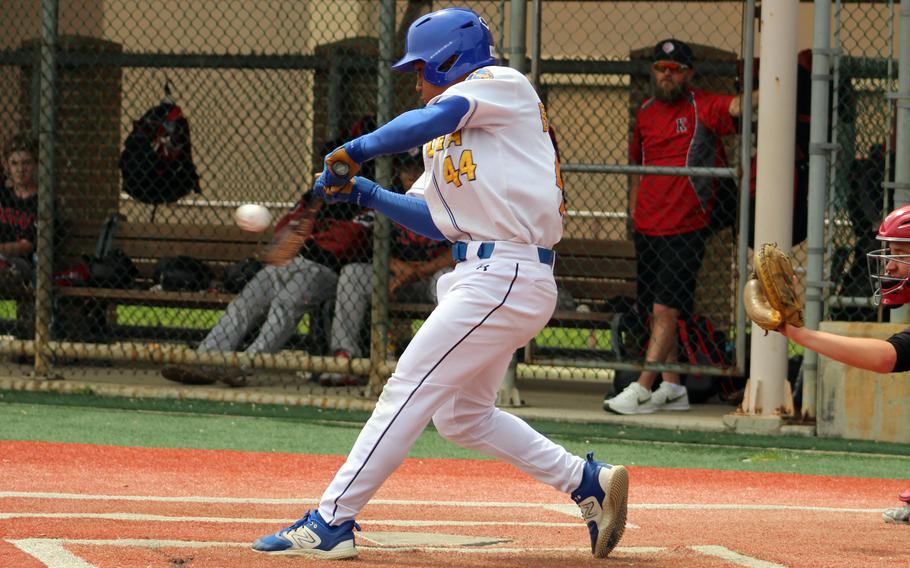 Yokota's Casey Bumpers makes contact during Tuesday's Division II baseball tournament playoffs. The Panthers lost 10-9 to E.J. King and will face host Osan for third place on Thursday.