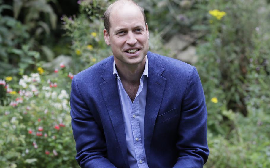 Britain’s Prince William speaks with service users during a visit to the Garden House in Peterborough, England. Prince William has criticized some of the world’s richest men for using their wealth to fund a new space race and space tourism, and called on the world’s great minds to fix the planet first. The Duke of Cambridge spoke to the BBC about climate anxiety, COP26, space travel, and his family’s long-standing commitment to environmental issues ahead of his inaugural Earthshot prize awards ceremony Sunday, Oct. 17, 2021.